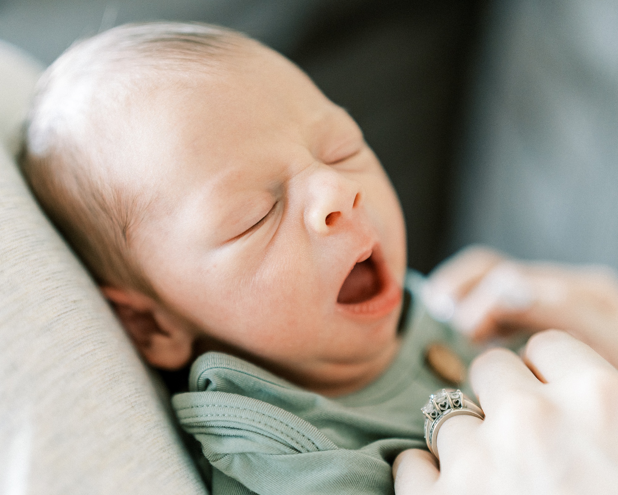 newborn baby sleeps during In Home Lifestyle Newborn photos