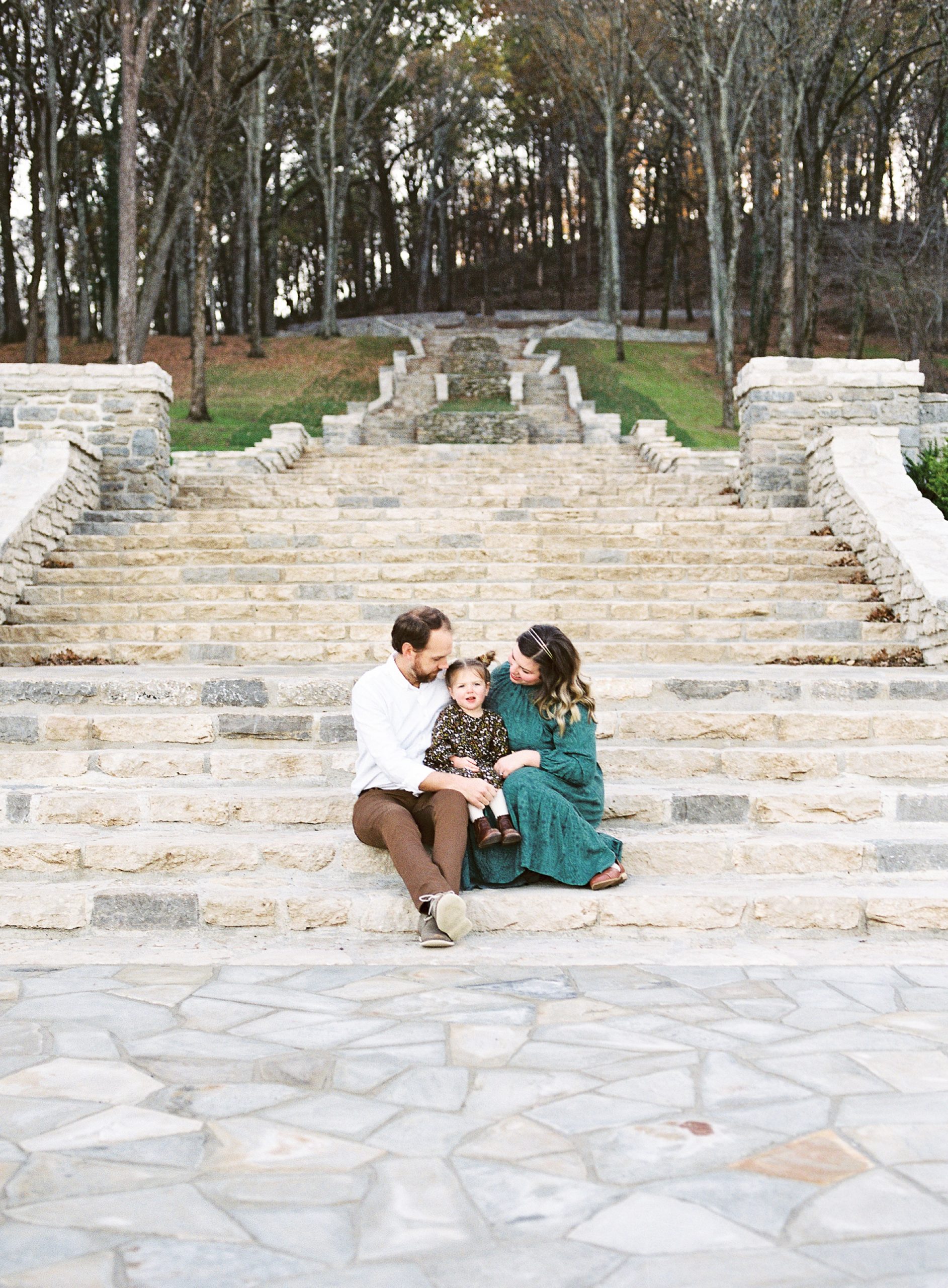 family sits on steps during Nashville outdoor family photos
