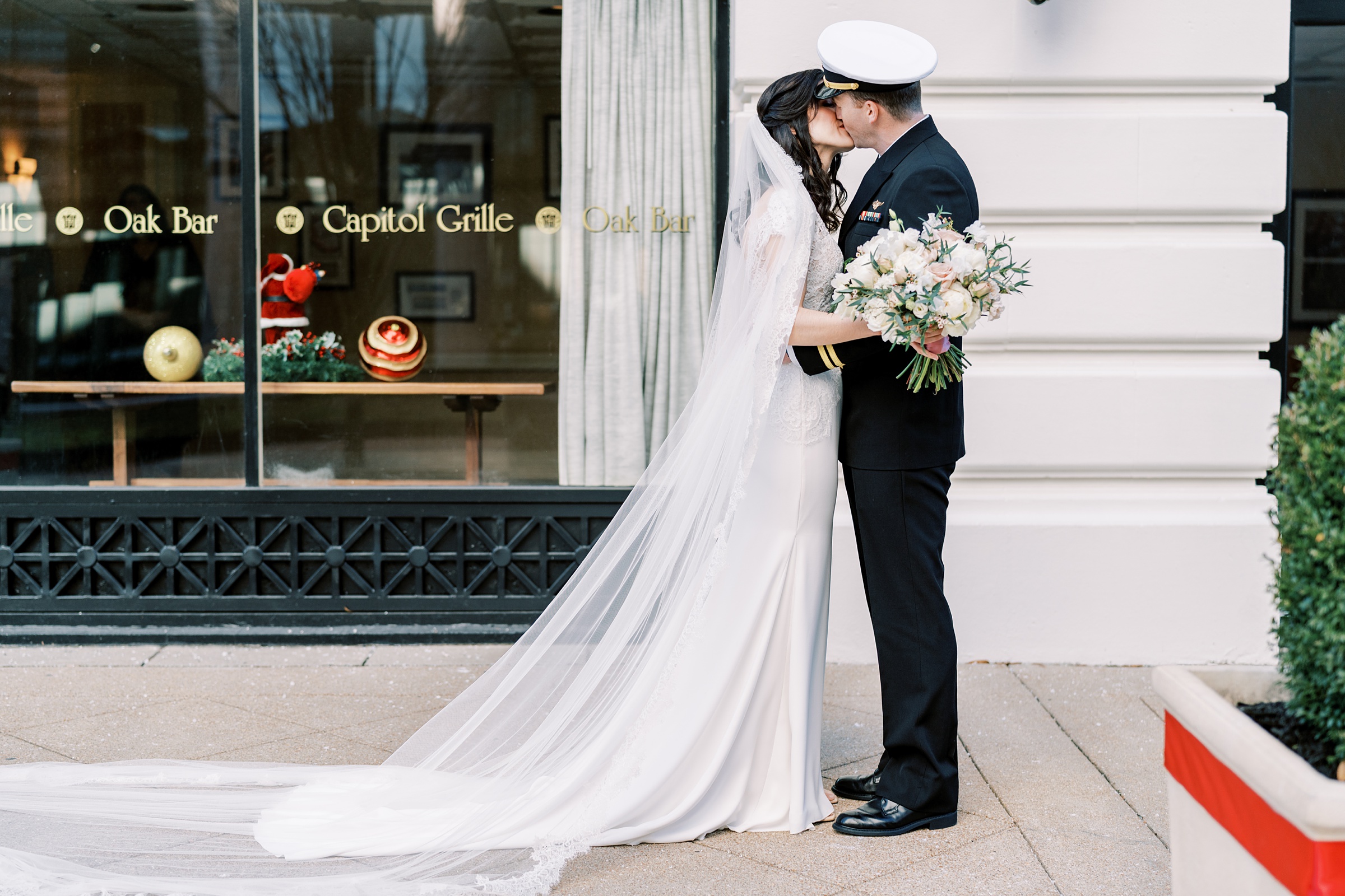 newlyweds kiss outside hotel during intimate Nashville wedding