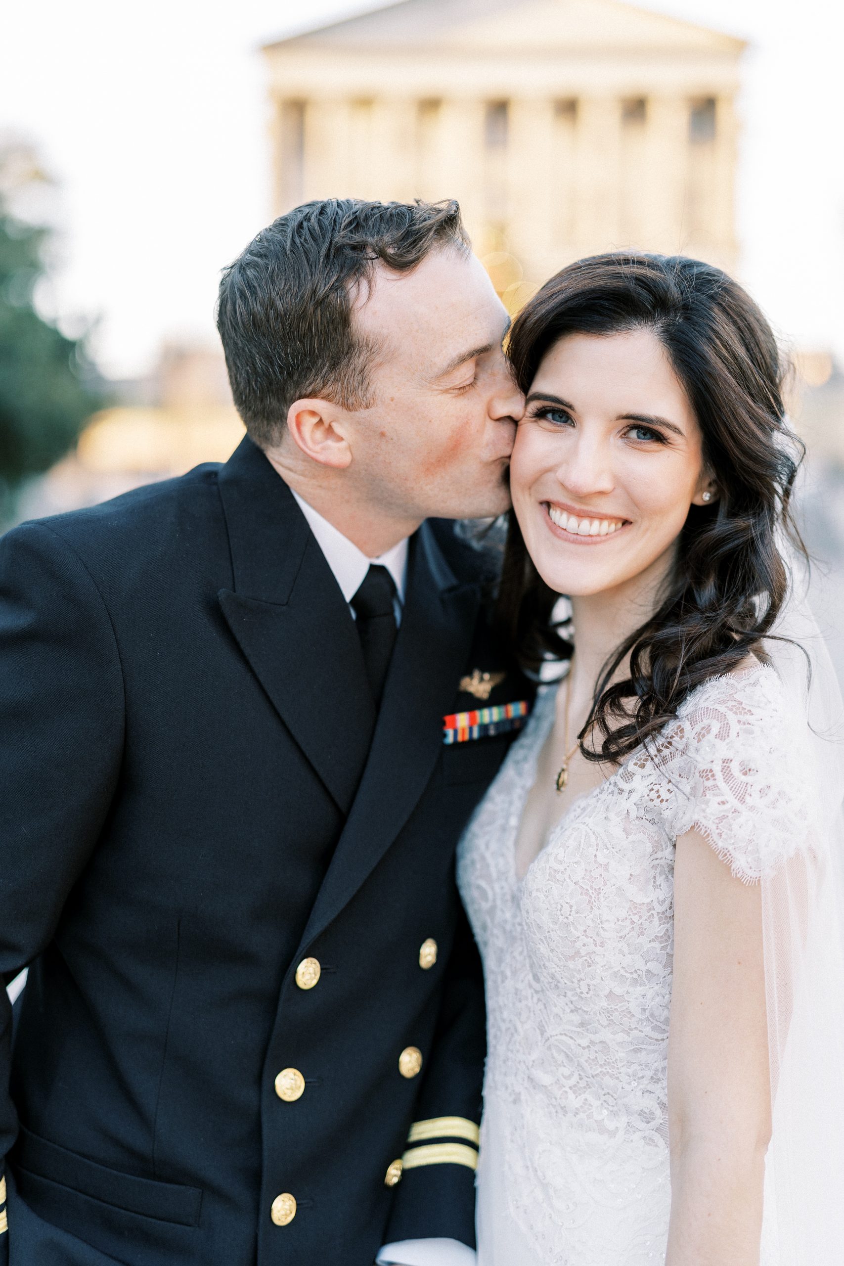 groom kisses bride's cheek during intimate Nashville wedding