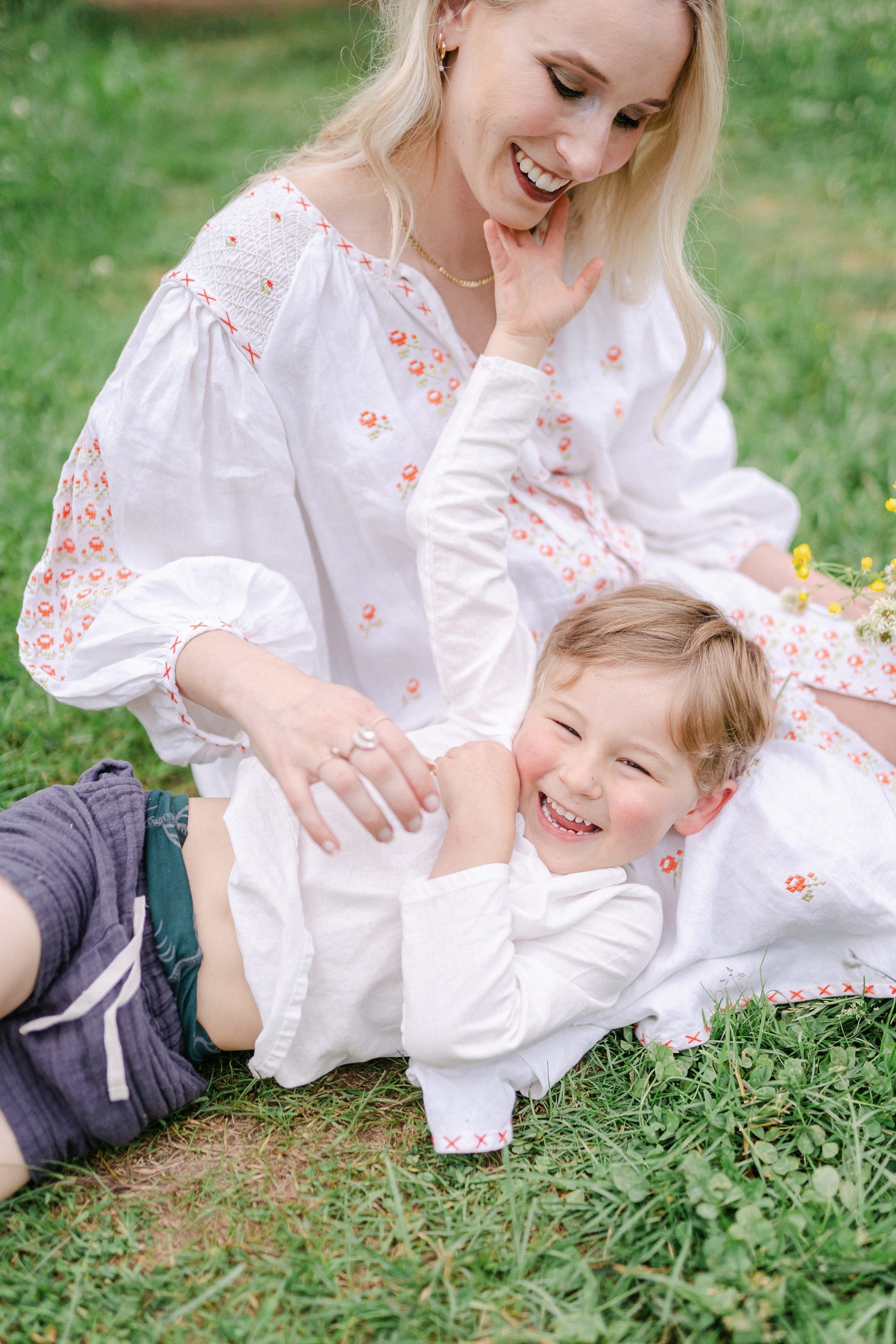 mom and son sit in grass in TN photos by Grace Paul Photography